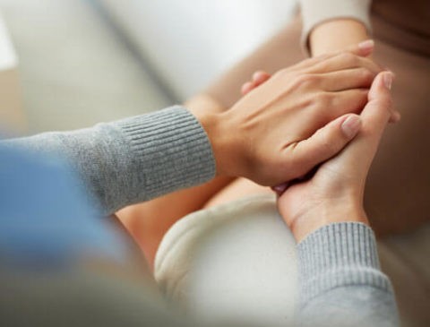 Holding hands at Freedom Healthcare Pittsburgh